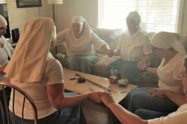 sisters praying